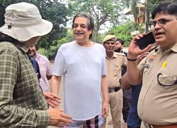 Chandrachud Singh talks with officials outside his residence during Gurugram demolition drive Chandrachud Singh talks with officials outside his residence during Gurugram demolition drive